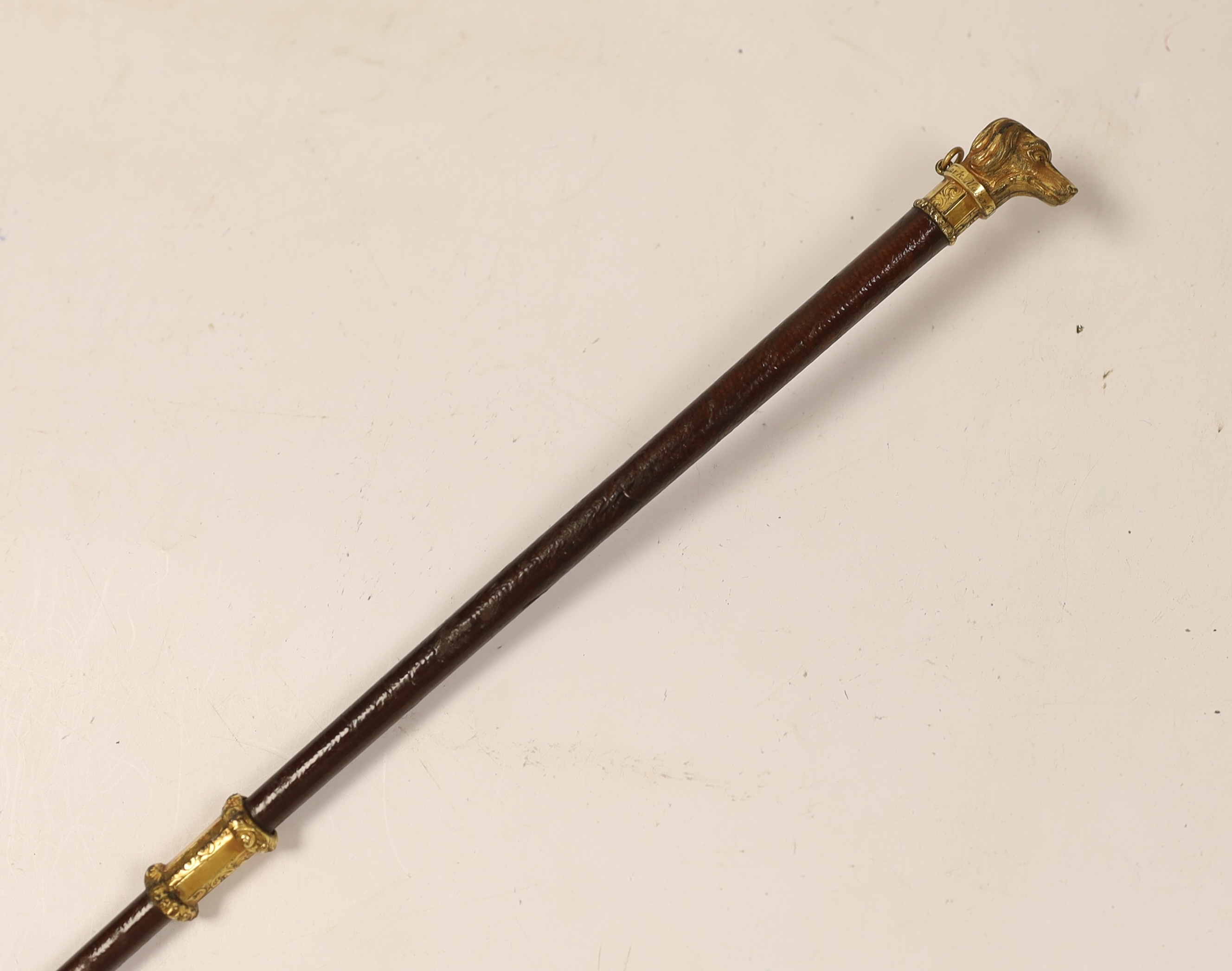 A 19th century riding switch with gilt metal terrier mount, signed Stark, 67 Burlington Arcade, 77cm long